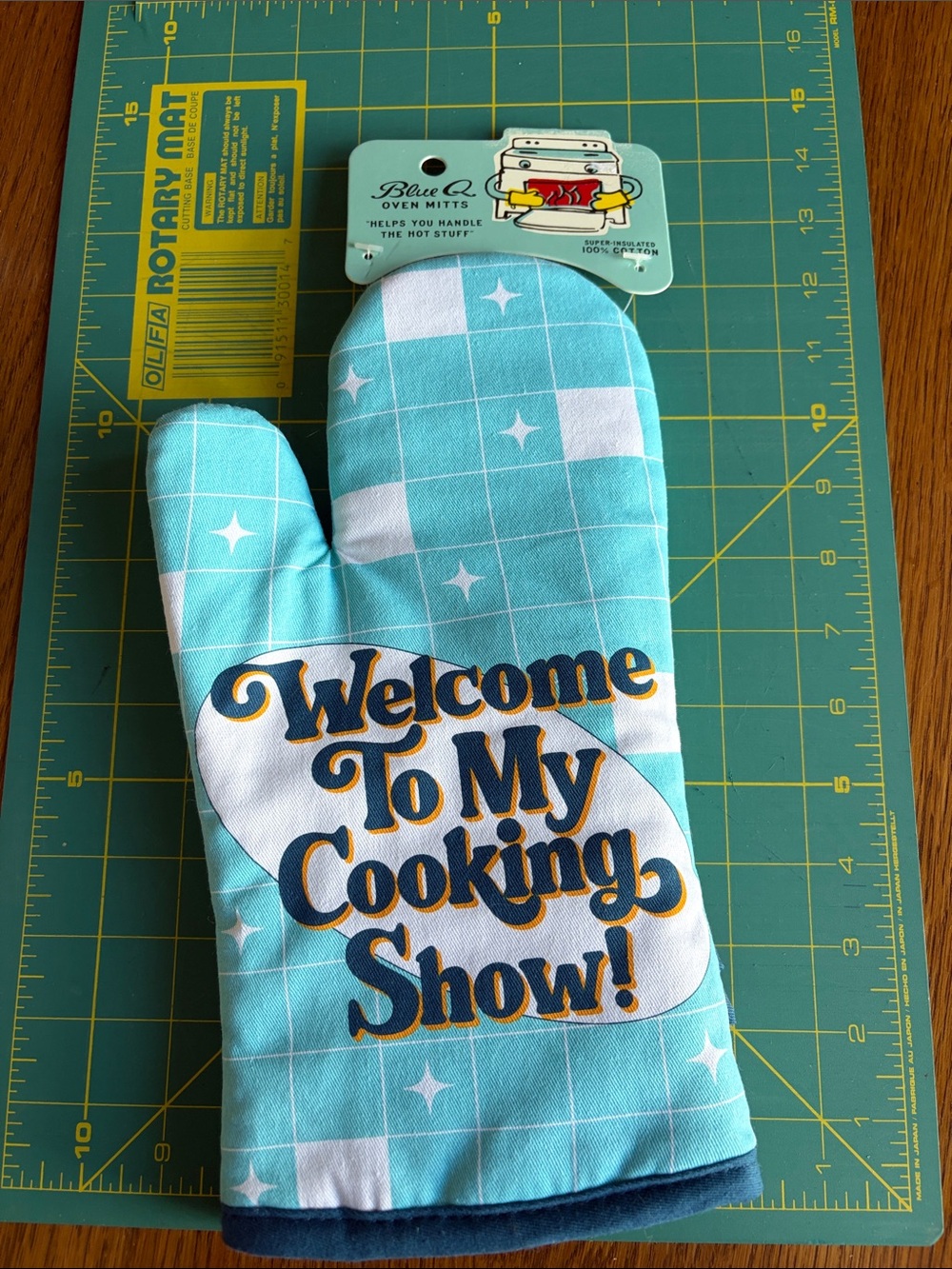 Blue Q Aqua and Navy 'Welcome To My Cooking Show' Oven Mitt